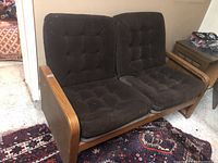 Front left angle view of loveseat showing overall condition and design