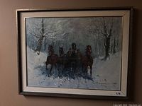 Front view of framed painting showing horse team in snowy forest