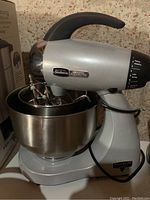 Sunbeam Mixmaster Heritage Series stand mixer model 2347 in silver metallic finish with black handle and speed selector dial.