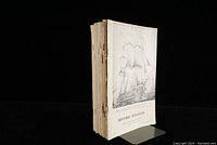 Stack of 10 early issues of Historic Kingston magazine with front cover of issue 1 visible showing a detailed black and white sailing ship illustration.