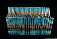 Two rows of Hardy Boys spines, showing full set front and back rows.