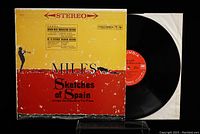 Front cover of the album shows wear and visible signs of age and handling on the red and yellow design with 'Miles Sketches of Spain' text and Columbia logo.