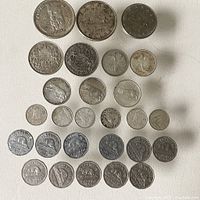 Overview of all Canadian coins in the lot including various denominations arranged on a flat surface.