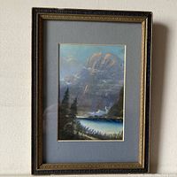 Framed original pastel artwork showing a mountain scene with lake, pine trees, and detailed pastel shading