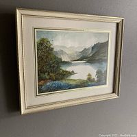 Framed watercolour landscape painting of Bassenthwaite Lake with hills and trees showing the full artwork and frame.