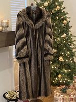 Full front view of the fox fur coat on display