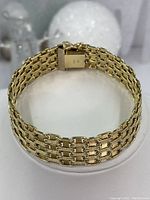 Top view of assembled bracelet showing woven link pattern and clasp