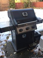 Full front-angle view of grill with closed hood