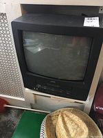 JVC 13-inch CRT TV front view showing curved screen and casing