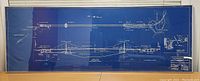 Front view of the framed blueprint print of the Golden Gate Bridge, showing the full technical drawing in blue.