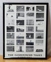 Front view of framed The Gashlycrumb Tinies poster showing 26 illustrated panels by Edward Gorey and title text.