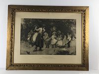 Front view of entire frame and vintage print showing decorative border and group scene