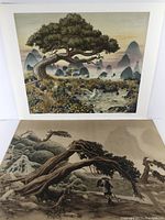 Two fine art prints laid out side-by-side, visible details of the artwork including trees and figures, showing overall condition and presentation as loose unframed prints.