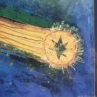 Close-up of abstract comet and star artwork on the poster.