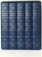 Five spines visible in original slipcase, labeled I–V with gold gilt lettering.