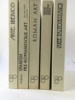 Spine view of the 5 art books showing the titles and beige textured covers.
