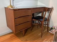 Full view of desk and chair from left