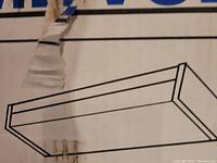 Box showing line drawing of fluorescent light fixture included in the lot.