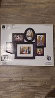 Box showing set of six Umbra Memories Collage Frames in black with various shapes and sizes.