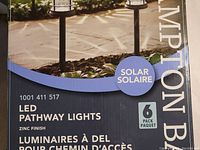 Photo of the Hampton LED solar pathway lights box showing 6 pack branding and zinc finish information.