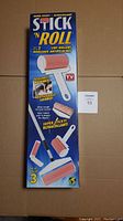 Full boxed set of Stick N Roll lint rollers showing packaging and branding.