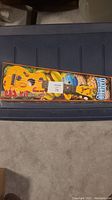 Mahalo Ukulele Kit in original box showing pineapple design on ukulele and packaging with brand and model.
