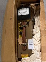 Oremaster Super Geiger Counter device in original cardboard box with protective packing visible.