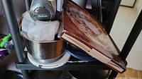 Vintage Sunbeam stand mixer with bowl and box containing large glass platter, together with food storage containers