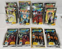 Full lot showing all 12 Spawn action figures in original blister packaging, arranged in rows with visible wear on packaging.