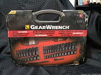 Outer cardboard box for GearWrench 44 pc 3/8" drive socket set showing wear and tear.