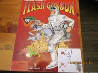 Front of box showing colorful Flash Gordon action figure artwork and branding