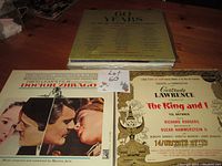 Photo showing 3 albums including 60 Years compilation, Doctor Zhivago soundtrack, and The King and I musical album.