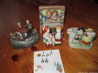 Five colorful vintage ceramic items on a wooden table showing all items in the lot