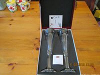 Pair of Moser flute glasses inside original box, showing the shape and arrangement.