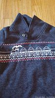 Dark grey toddler pullover sweater with train pattern and folded collar detail