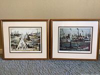 Two framed industrial landscape prints from Series 348, titled "The Canal" and "Canal Bridge." Sets of factories, smokestacks, canals shown. Frames and mat visible.