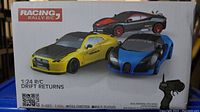 Box showing Racing Rally Drift Returns 1:24 scale remote control cars with images of three cars and a controller
