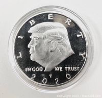 Obverse side of coin showing profile of Donald Trump with inscriptions and year 2020.