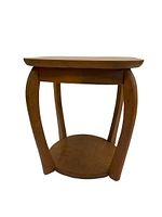 Front view showing the rounded rectangular top, curved legs, and circular lower shelf of the wood side table.