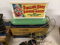 Ringling Bros and Barnum & Bailey electric billboard on top of a Gilbert American Flyer box with wires connected