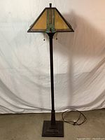Front view of floor lamp showing full height and shade