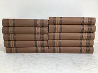 Front view of ten volumes of Parkman's Works showing spines with gilt titles and uniform brown bindings.