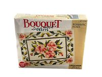 Box showing Bouquet Latch Hook Crafts branding with Romantic Roses floral latch hook pattern on front. Packaging shows some wear.