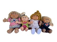 Lot of 4 Cabbage Patch Kids dolls showing size and clothing details.