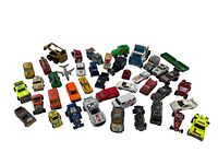 Lot of 42 vintage Dinky toy cars and trucks in assorted styles and colors spread on white background.