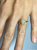 Ring worn on hand, front view