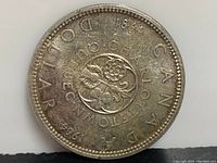Reverse side showing floral emblem design with text 'CANADA', 'DOLLAR', '1867', '1967', 'CHARLOTTETOWN'.