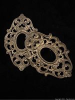 Two large ornate oval brass findings with intricate openwork detailing