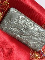 One face showing “P.M.C” maker’s mark above embossed eagle design