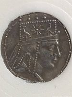 Obverse close-up showing right-facing bust of King Tigranou with beaded diadem and star motif